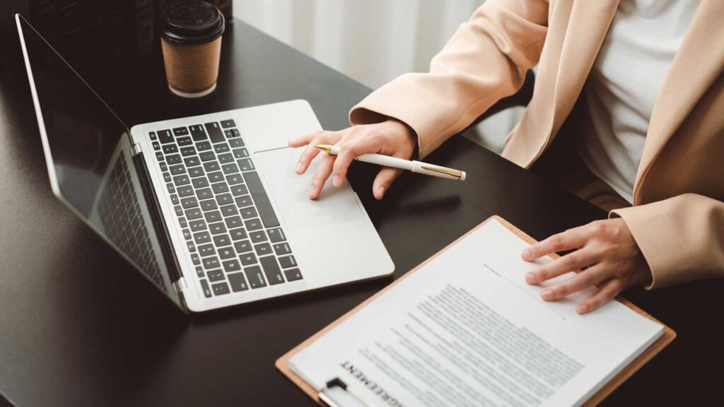 Legal professional reviewing case documents related to No Surprises Act arbitration enforcement