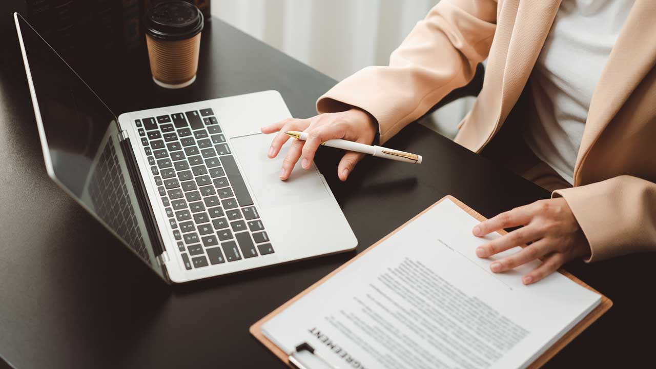 Legal professional reviewing case documents related to No Surprises Act arbitration enforcement